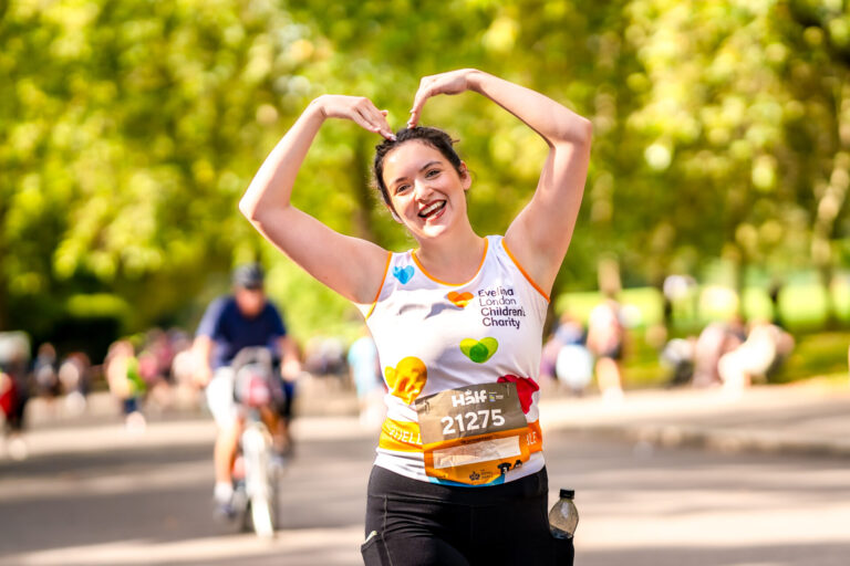 Image of a woman running the Royal Parks Half Marathon
