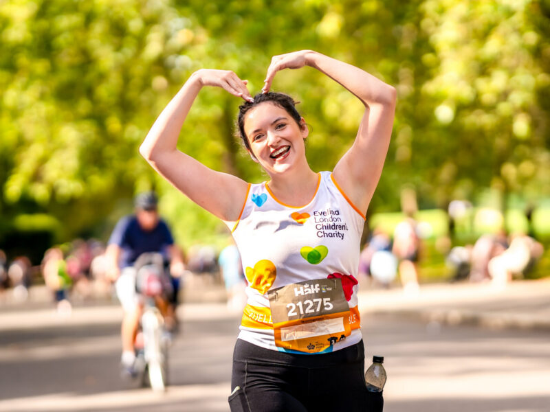 Image of a woman running the Royal Parks Half Marathon
