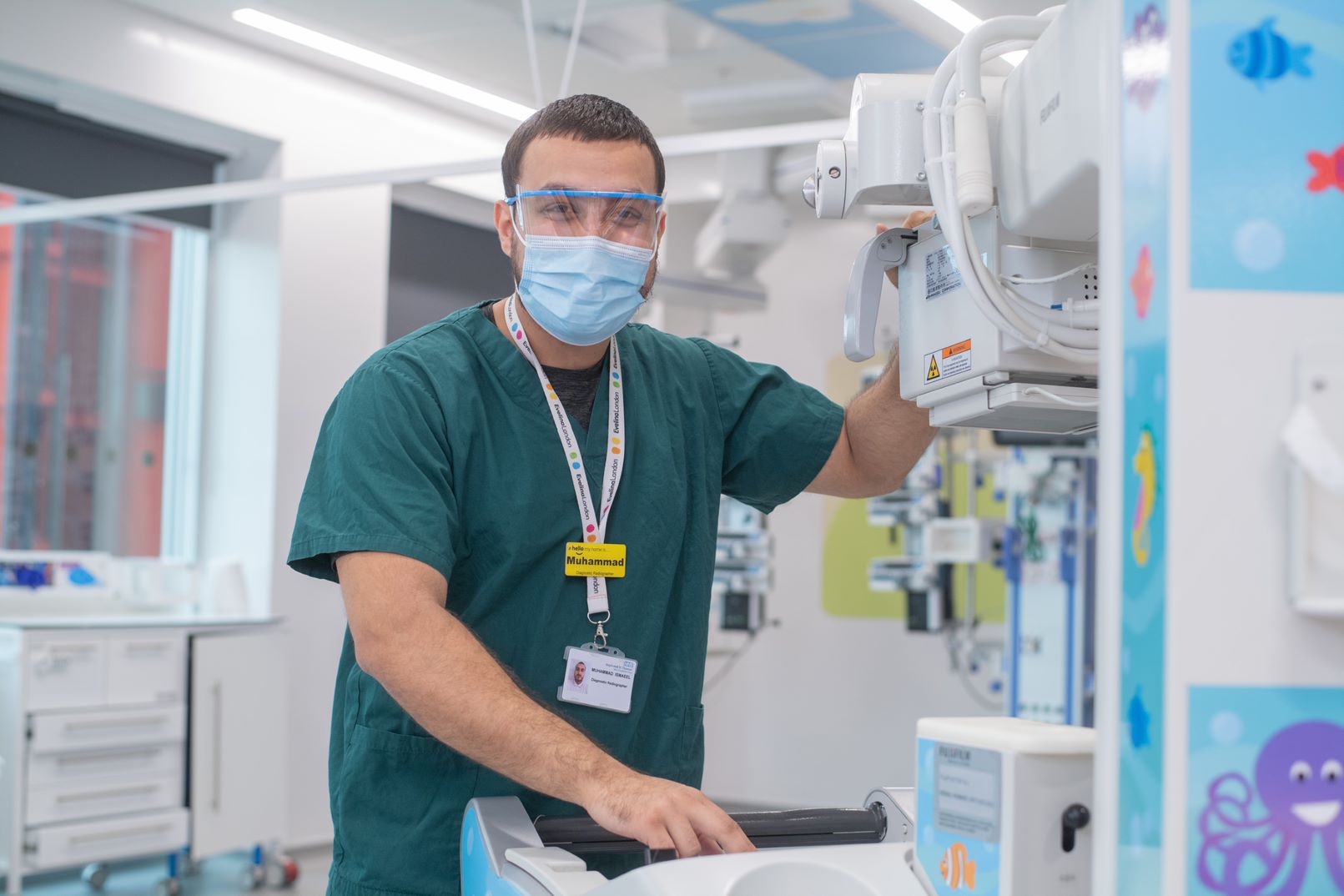 Male Evelina staff with equipment