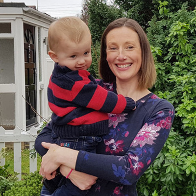 Caroline May holding her son Arthur