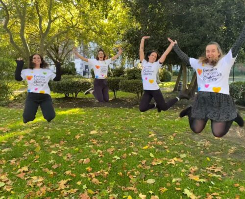 Staff jump in the air in Evelina t shirts