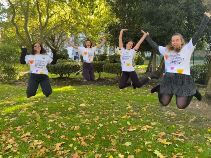 Staff jump in the air in Evelina t shirts