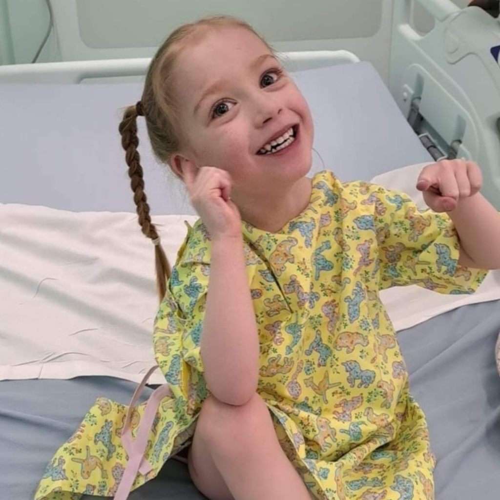 Image of Annabelle smiling in her hospital gown