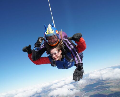 Laura skydiving with instructor, to fundraise for Evelina London Children