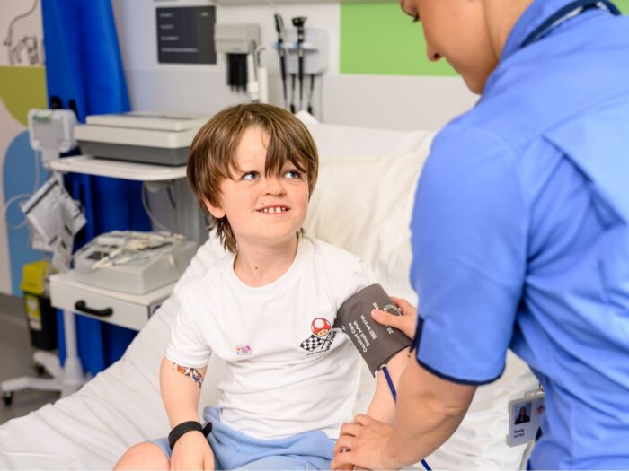 Oliver getting his blood pressure measured on Evelina London Children
