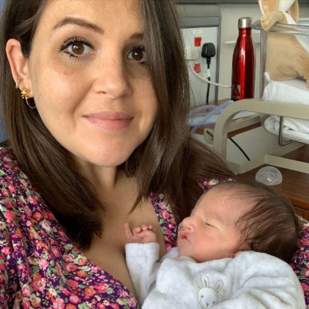 Anita holding her son Dylan at Evelina London Children