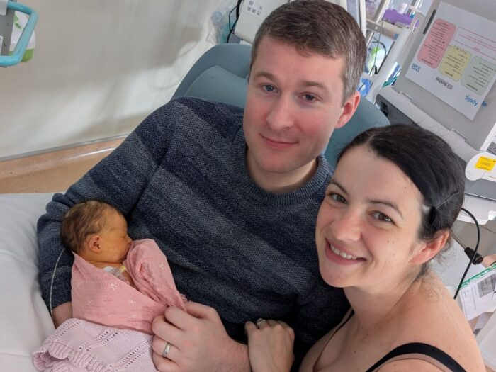 Baby Ada being held by her parents Nick and Becky at Evelina London Children
