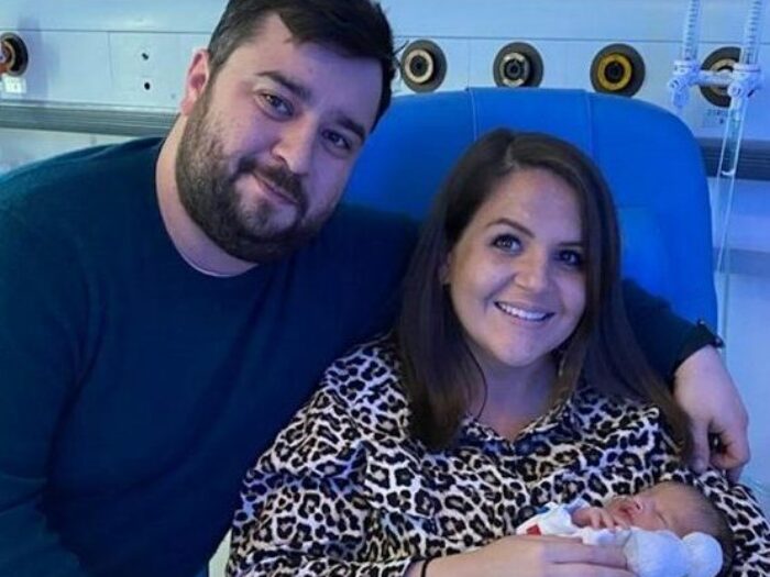 Nick and Anita welcoming their son Dylan. Anita is holder him in her arms, they