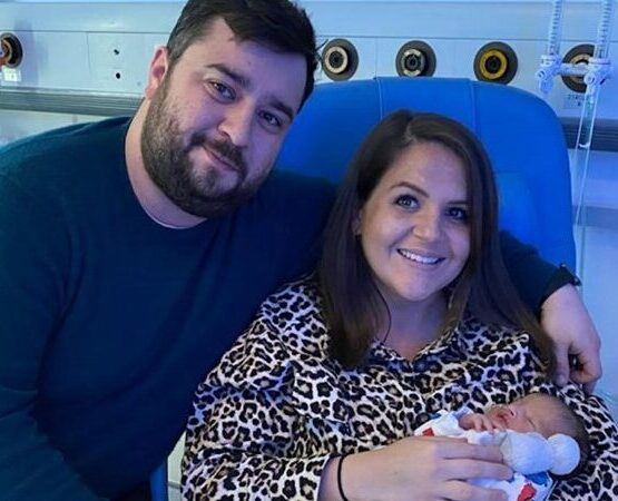Nick and Anita welcoming their son Dylan. Anita is holder him in her arms, they
