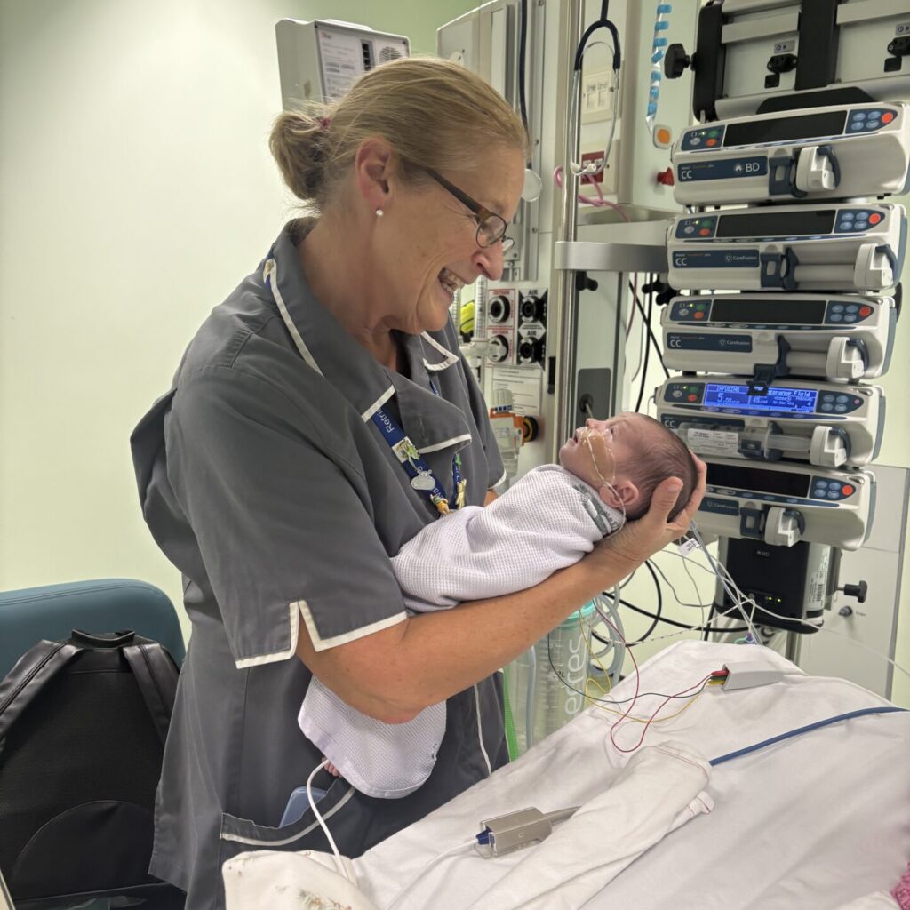 Jo, a paediatric intensive care nurse at Evelina London with Grace