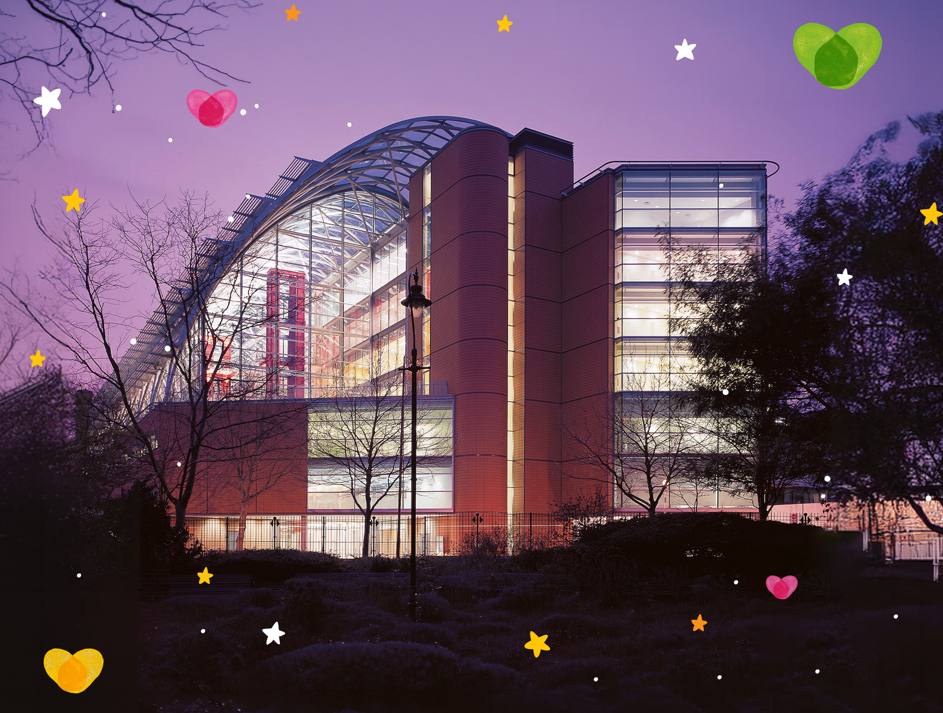 Image of Evelina London Children's Hospital at dusk, with heart and star motifs